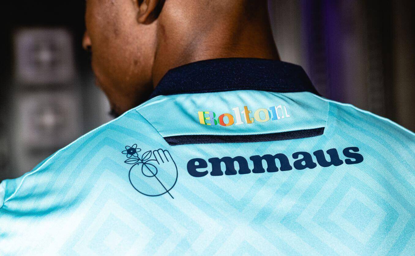 Bolton Wanderers forward Victor Adeboyejo shows Emmaus on the back of the football shirt