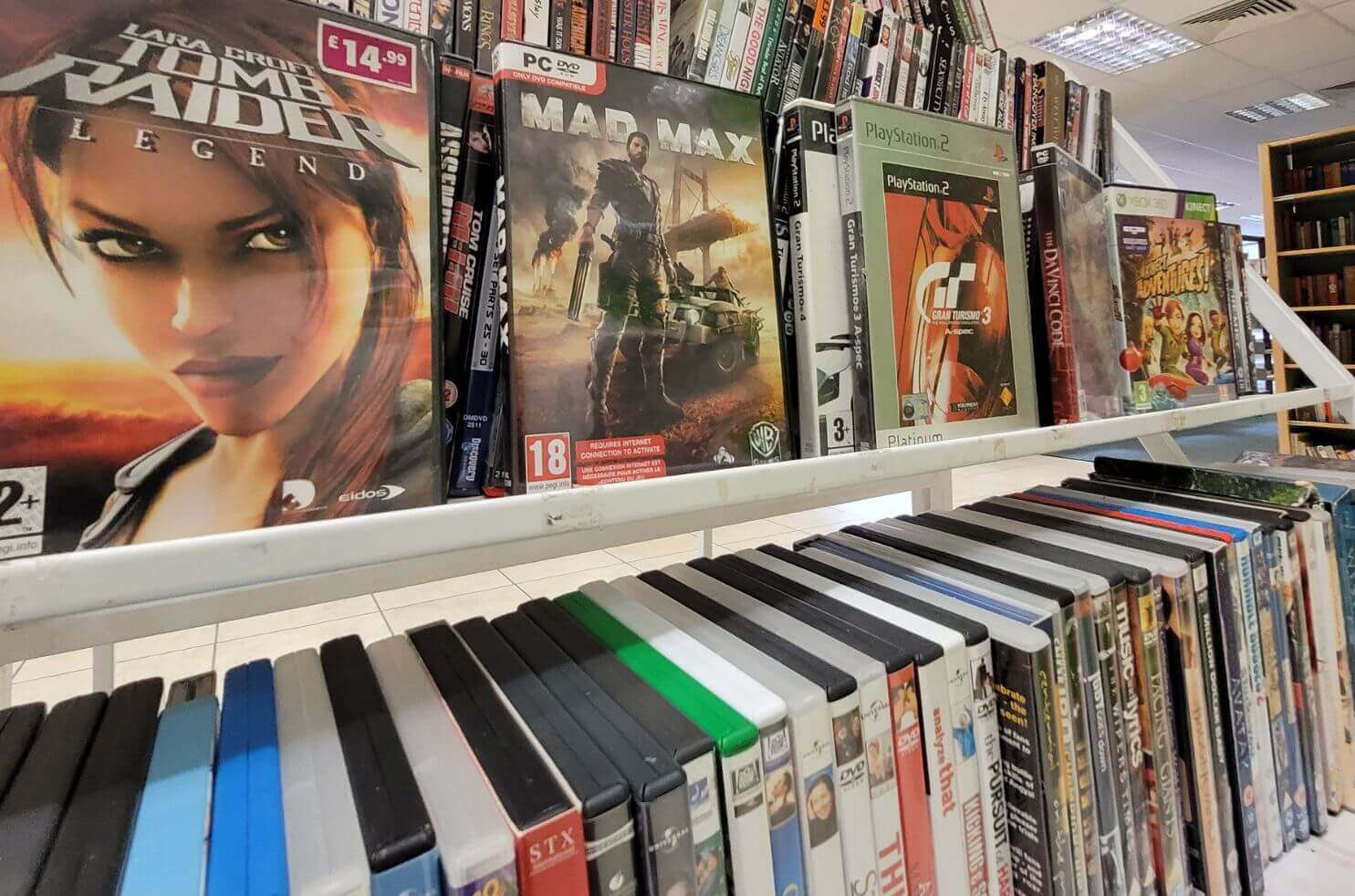 Danielle's top five preloved console games on the shelf of the top floor of Emmaus Department Store