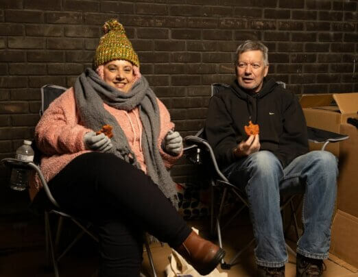 Two companions brave the winter elements for the St Albans Sleepout