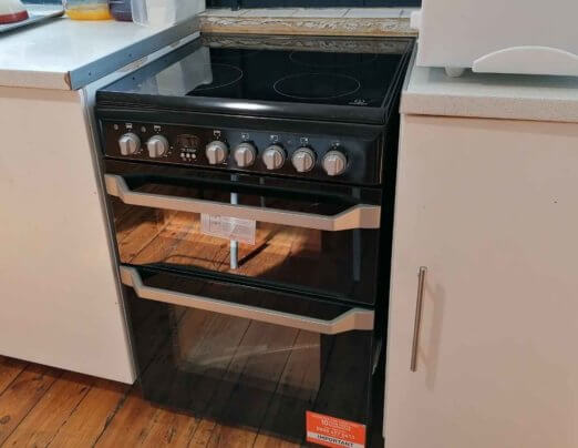 Stowe Family Law donate new cooker to Emmaus Leeds community kitchen