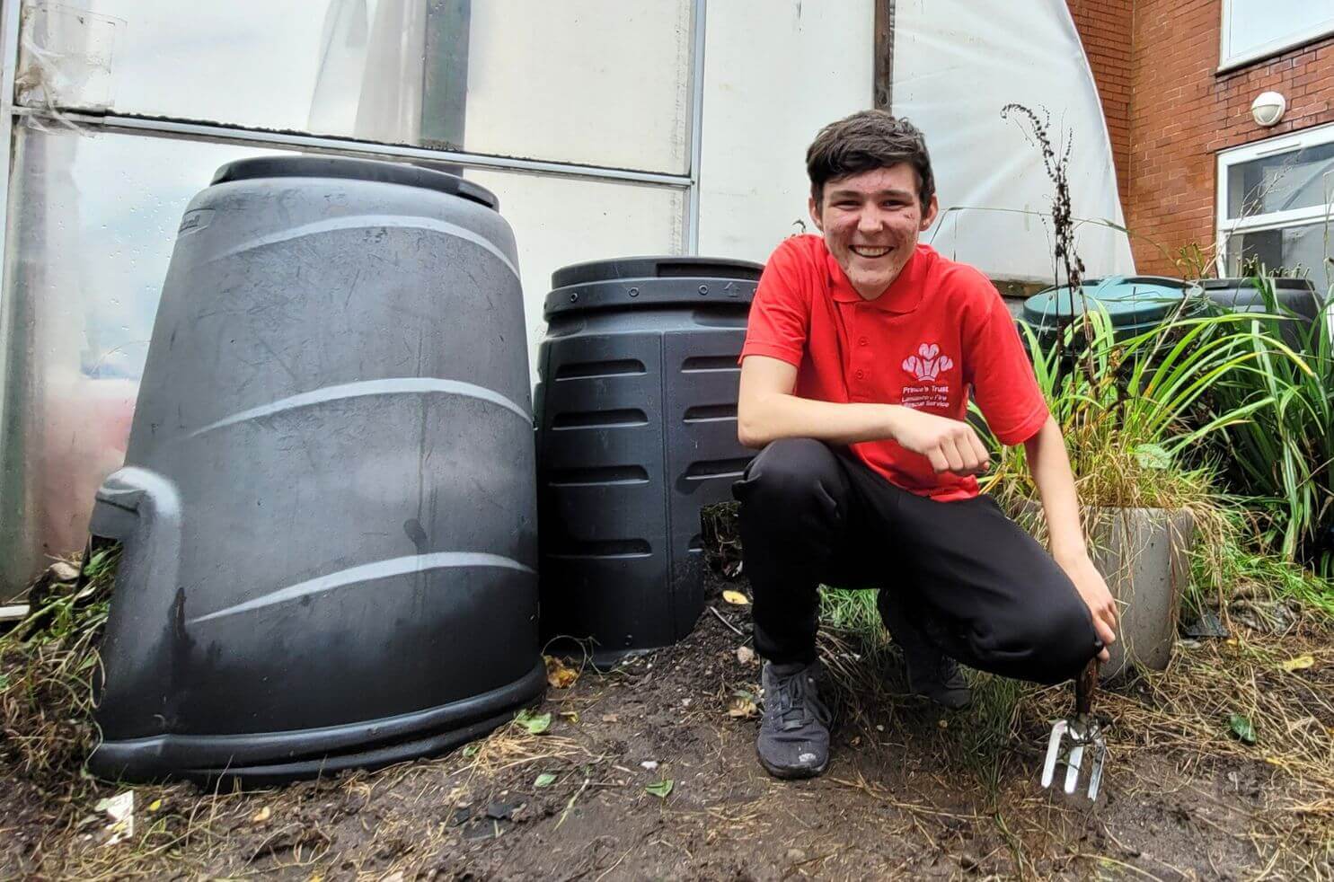 Bobby from the Prince's Trust helped clear our community gardens ready for planting
